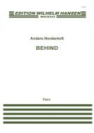 Behind 